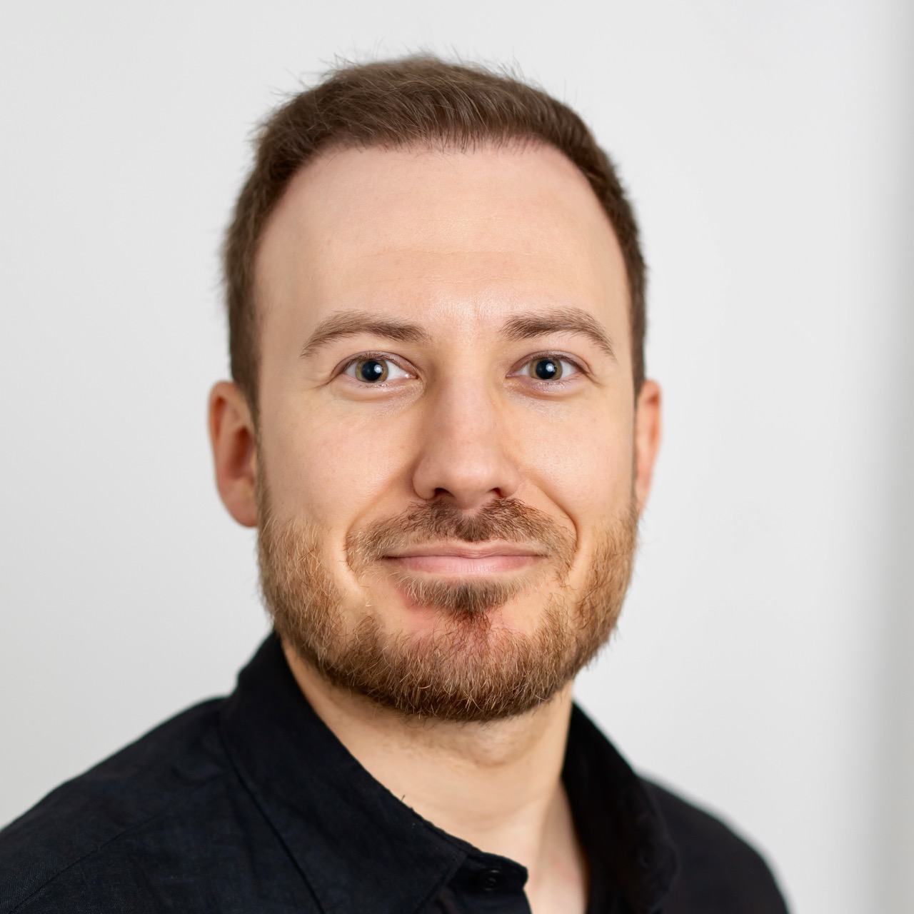 Black and white headshot of Paul Kindermann